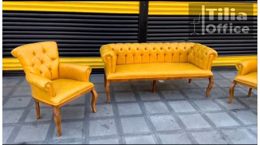 Tilia Mini Chester ofis oturma grubu, kompakt boyutlu, siyah deri ve kapitone dikişli.